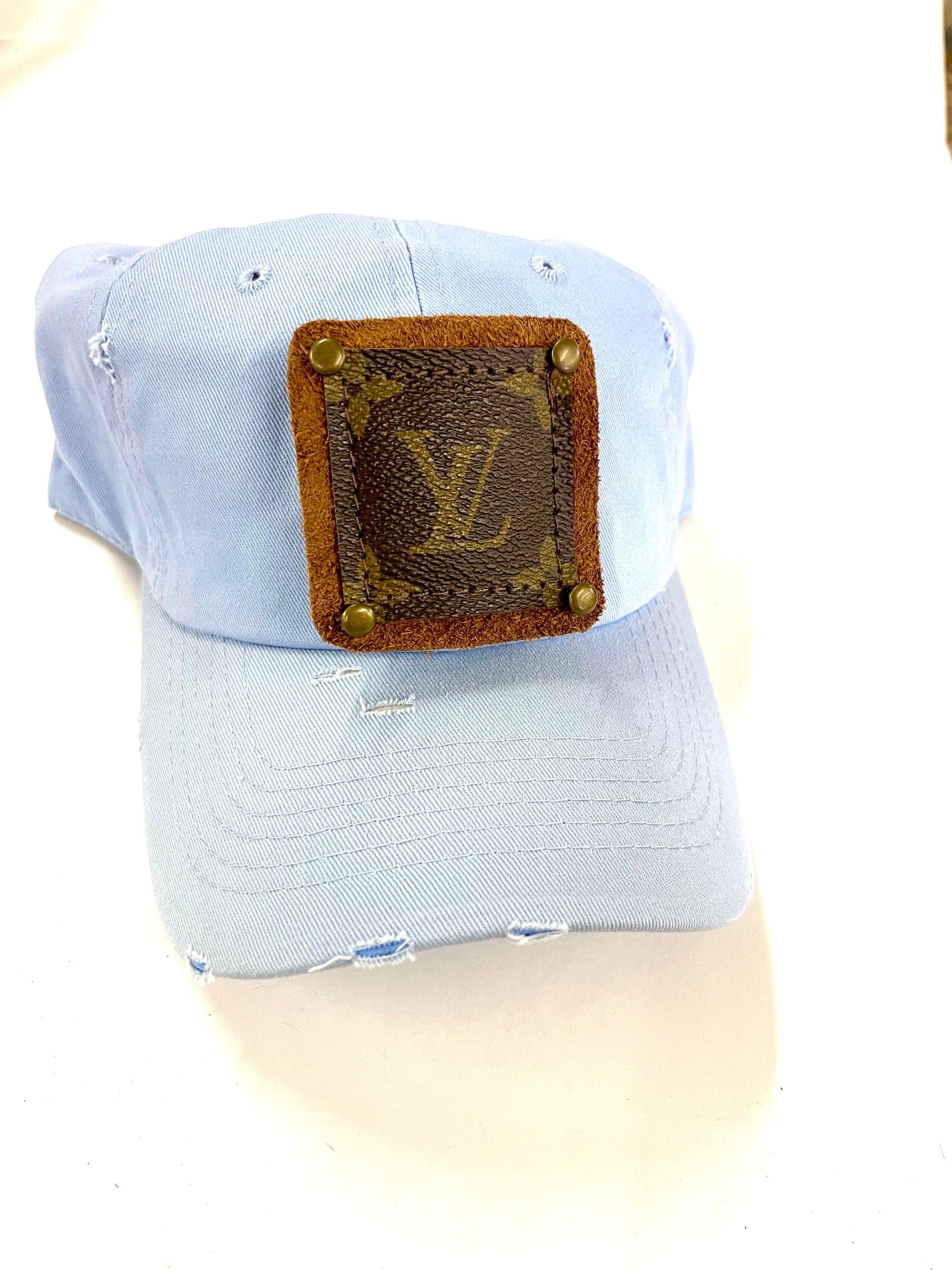 L.V. Patch distressed camo hat .