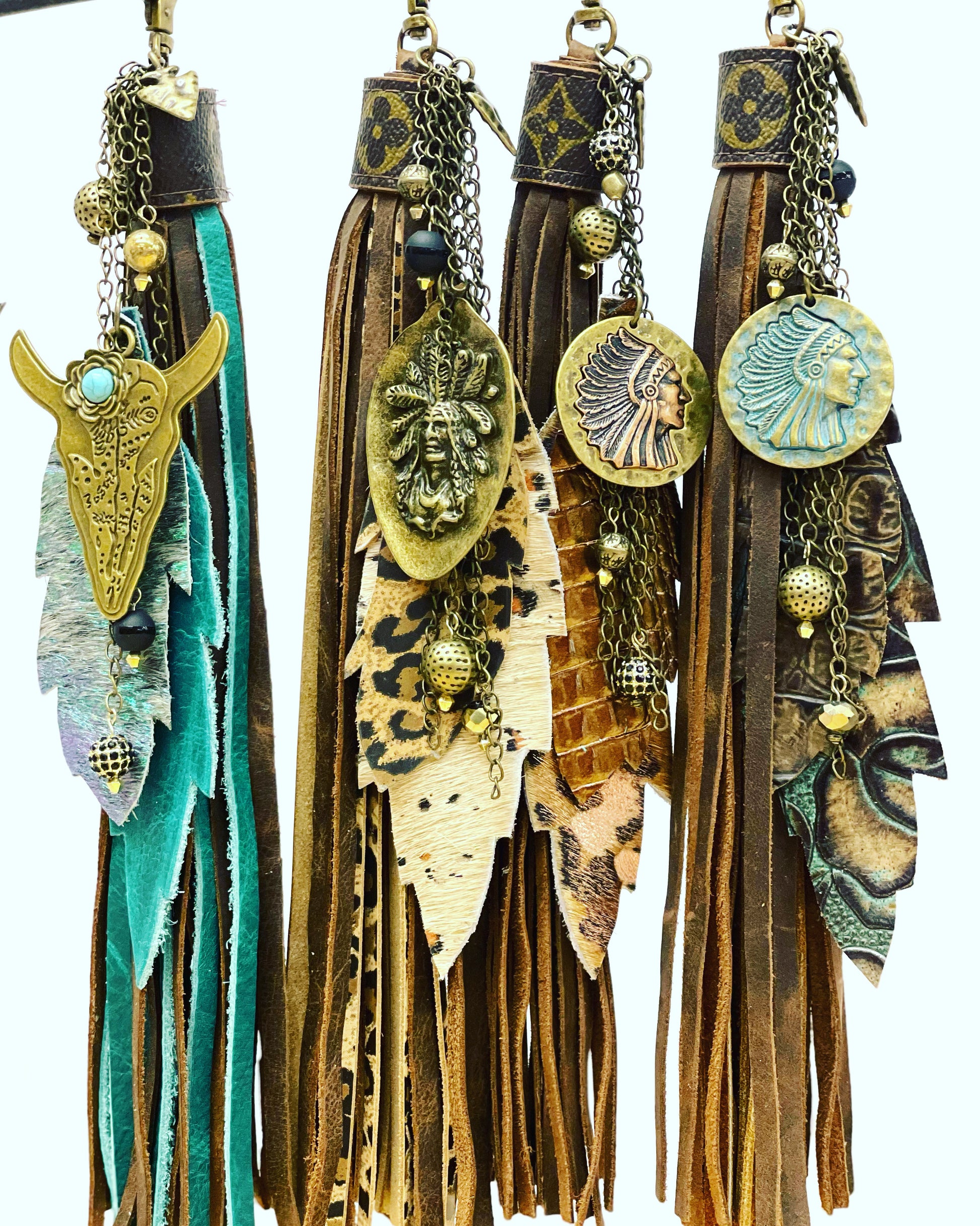 Long purse tassel -brown and turquoise embossed feathers, tarnished Indian Chief round pendant - Patches Of Upcycling