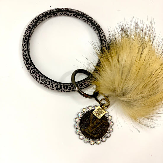 O Ring Keychain in black & white cheetah with puff ball - Patches Of Upcycling
