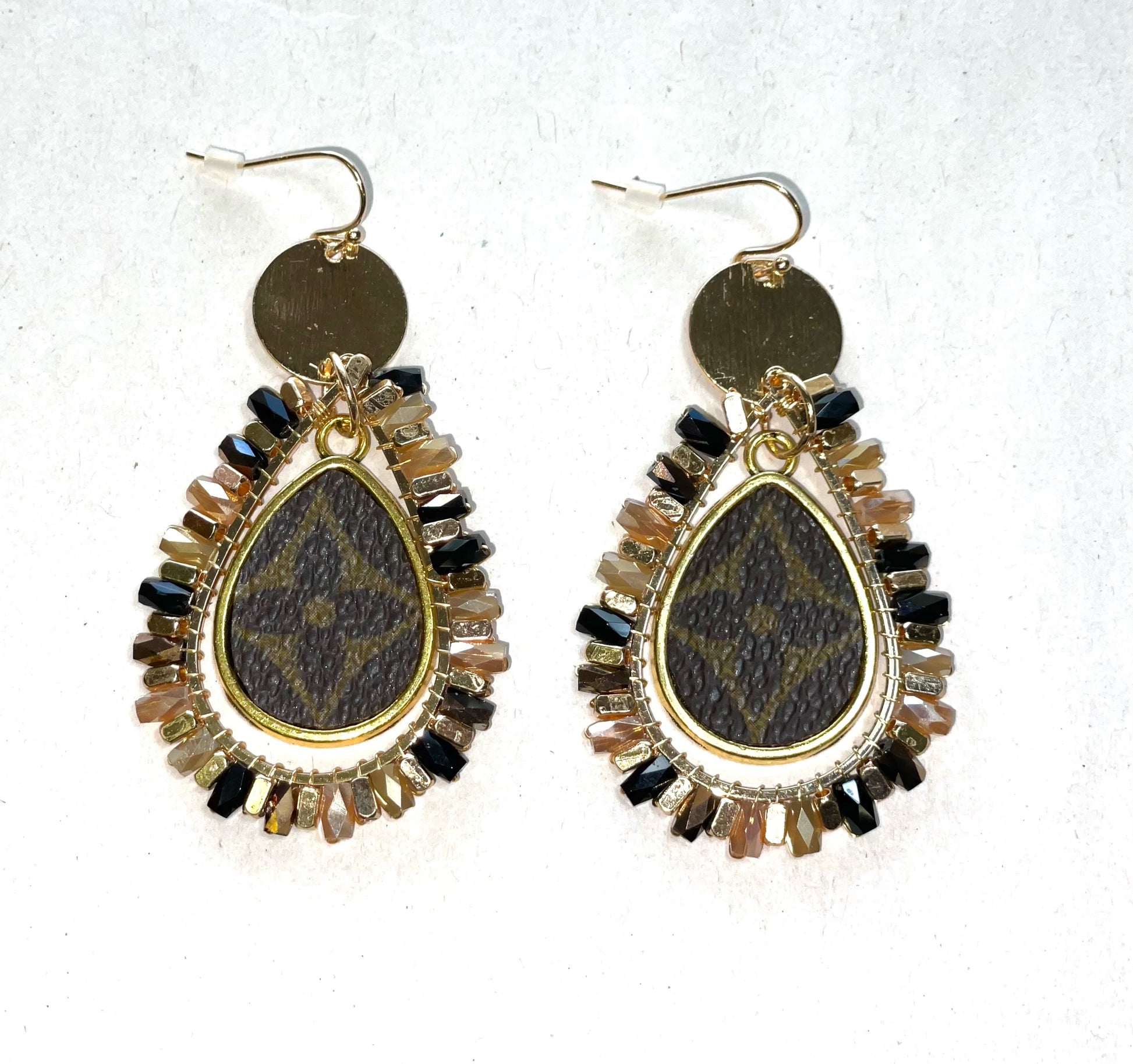 Beaded tassel earrings in gold and black with flourish - Patches Of Upcycling